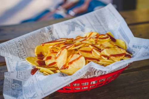 Basket of Pub Chips with Sauce image - Freephoto 