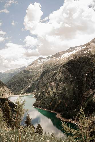austria lake in the middle of mountains travel