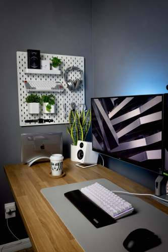 white ceramic mug on brown wooden desk 