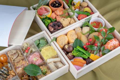  chocolates and fruits on three boxes 