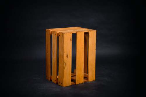 batu brown wooden crate with black background indonesia