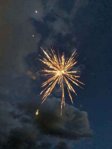  yellow fireworks in the sky 
