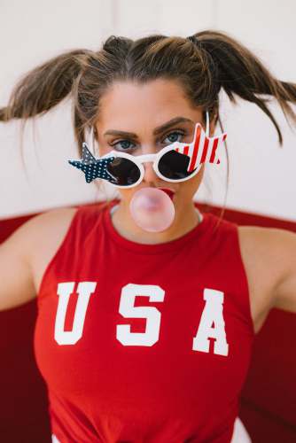 boise woman in red tank top wearing sunglasses 