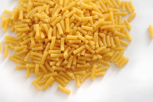 Pile of Dry Uncooked Macaroni on White Background - Free 