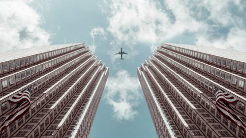 Airplane Between Buildings  - NegativeSpace